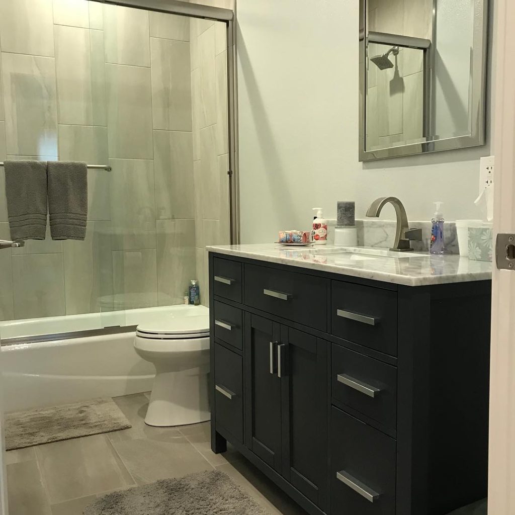 bathroom remodel with new vanity and shower